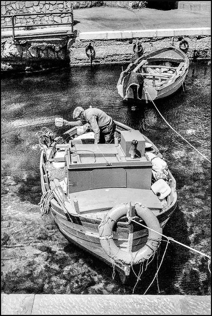 a fisherman on a boat in Sicily