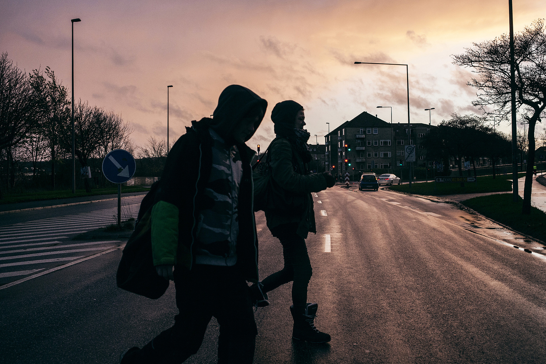 Martin and Lina walking towards the city to beg for money. They sometimes get as much as 250$ per day. They use it all on cocaine.
