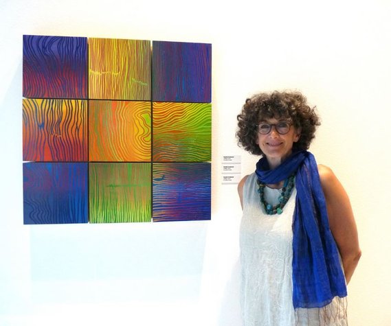Danielle Grosbusch at her exhibition at the International Bank Luxembourg