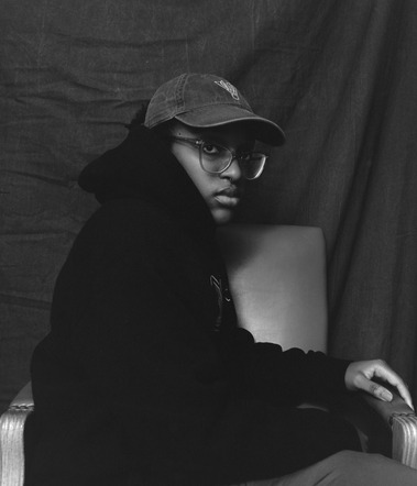 Self portrait of Yvonne Uwah taken on black and white film.