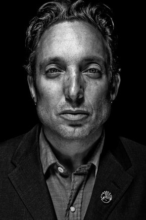 Gritty black and white portrait photo of drummer Michael Urbano from the series Exteriors by Kelly Castro
