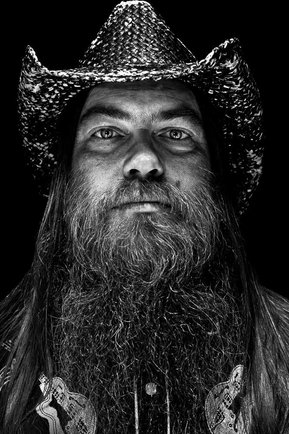 Gritty black and white portrait photo of a man from the series Exteriors by Kelly Castro