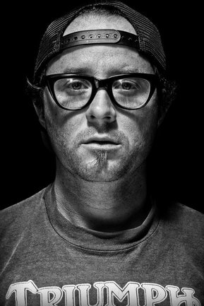 Gritty black and white portrait photo of a man from the series Exteriors by Kelly Castro