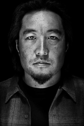 Gritty black and white portrait photo of a man from the series Exteriors by Kelly Castro