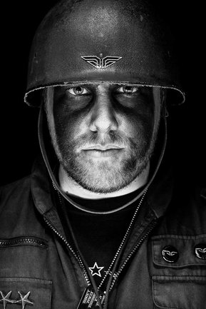 Gritty black and white portrait photo of a man from the series Exteriors by Kelly Castro