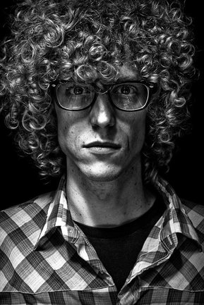 Gritty black and white portrait photo of a man from the series Exteriors by Kelly Castro