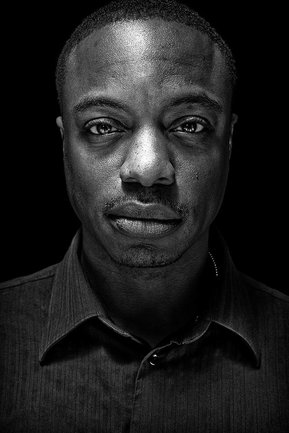 Gritty black and white portrait photo of TWIP host Frederick Van Johnson from the series Exteriors by Kelly Castro