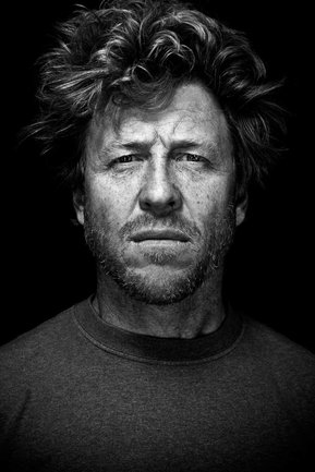 Gritty black and white portrait photo of a man from the series Exteriors by Kelly Castro