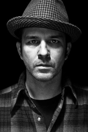 Gritty black and white portrait photo of Greg Camp from the series Exteriors by Kelly Castro