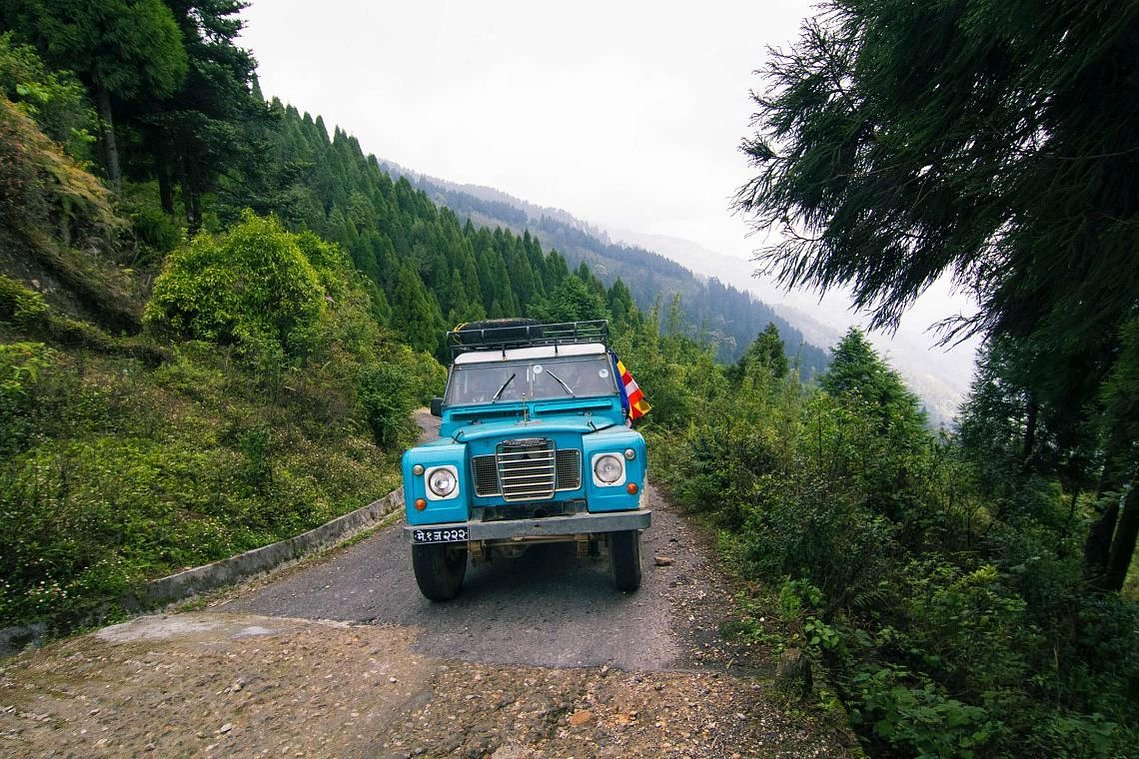 Land Rover climbing up the hill to Chitrey Monastrey