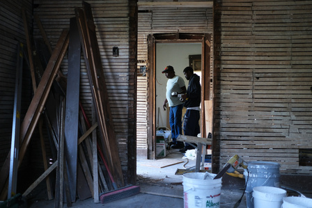 Matt and Marshall go over plans for the new electrical outlet boxes.