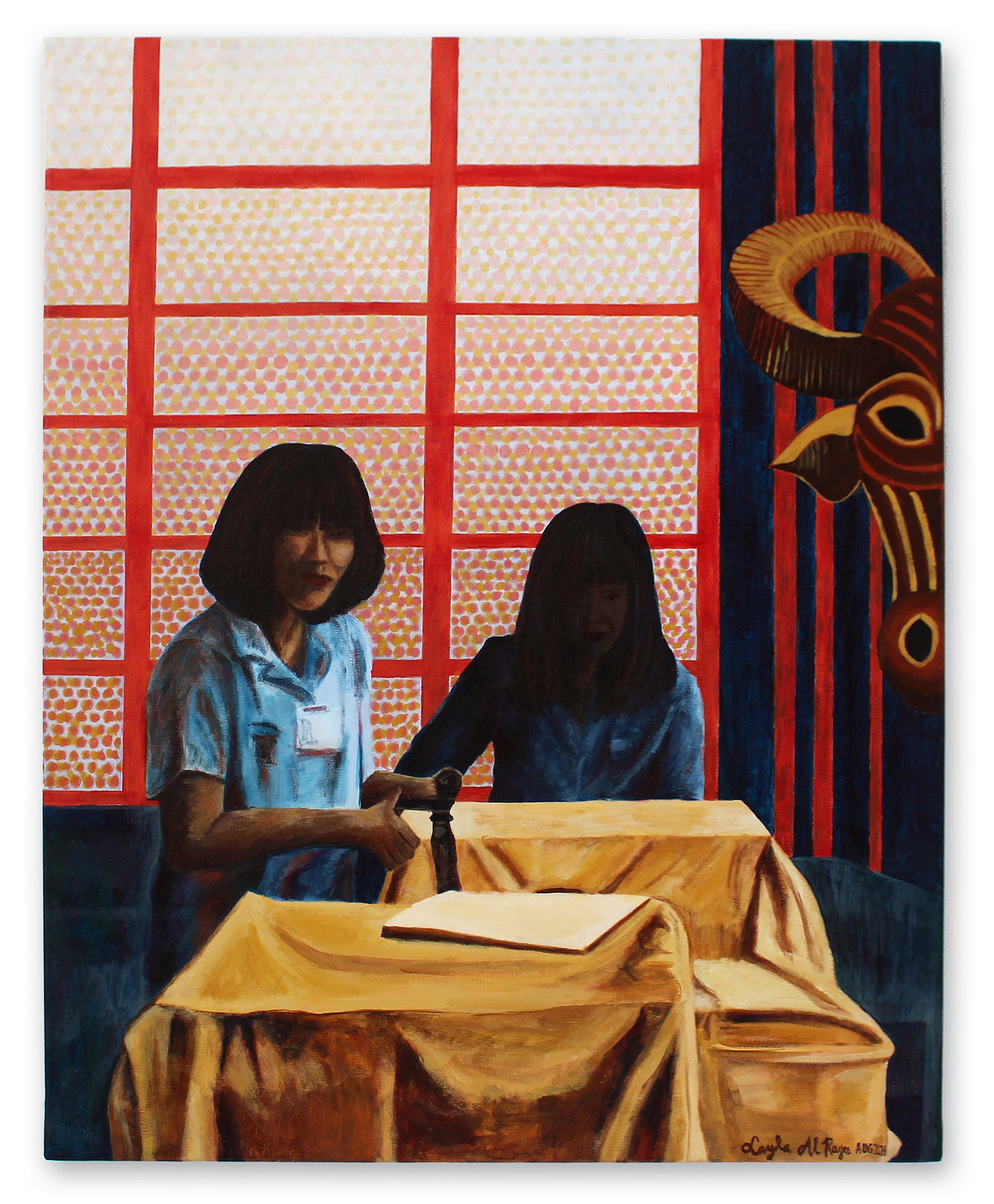 Kalabaw, the water buffalo is the national animal of the Philippines. A symbol of hardwork, resilience and perseverance that many Filipinos identify with. Two women busy working in a factory with a hanging sculpture of the Kalabaw cropped to the right.