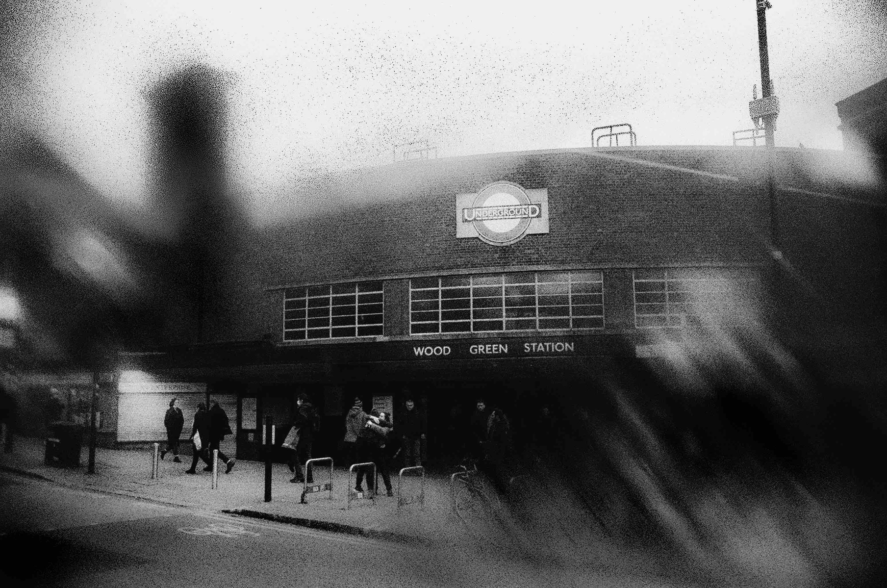 black and white, grainy 35mm picture of Wood Green station.