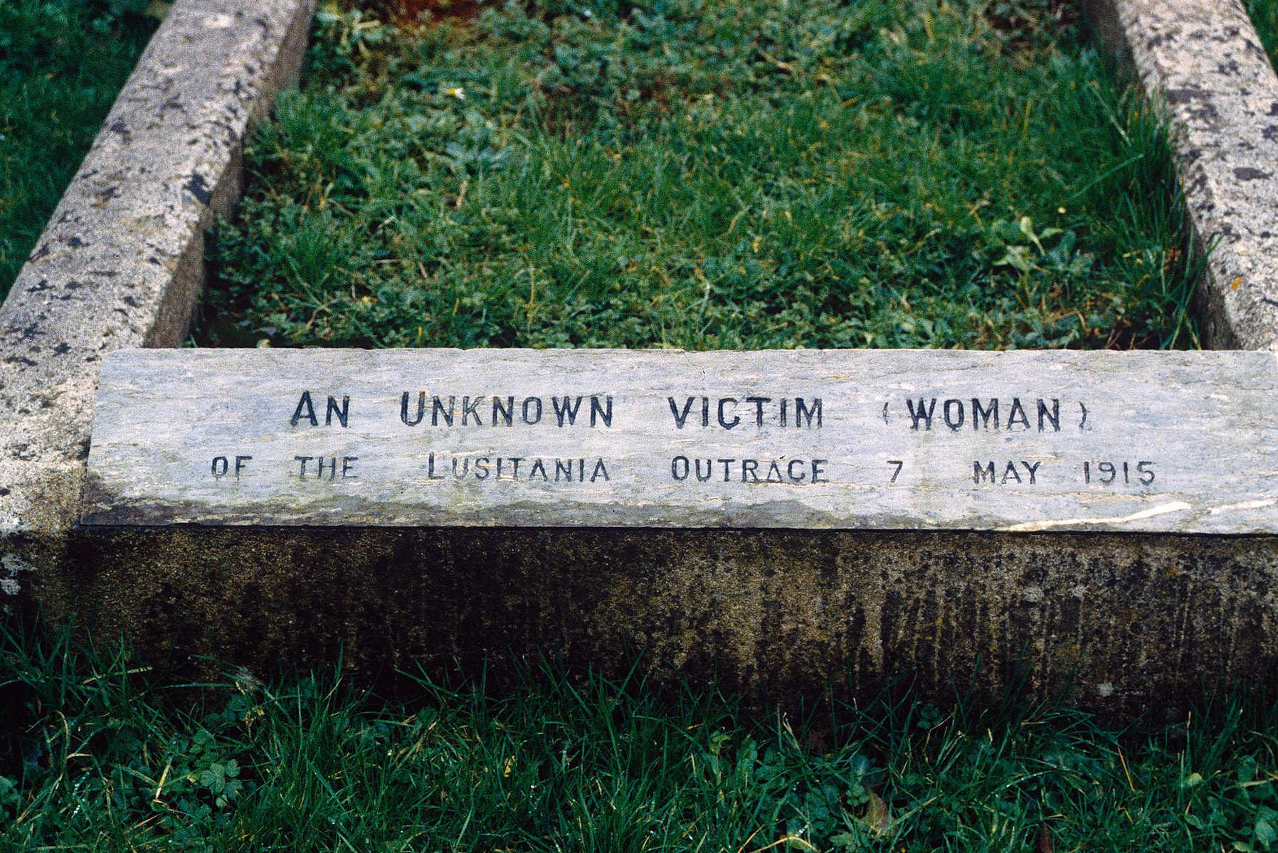 Photographed on Kodachrome slide film in the 1980s. This gravestone at St Multose marked an “unknown victim (woman)” of the Lusitania tragedy—a mystery that lingered for decades.