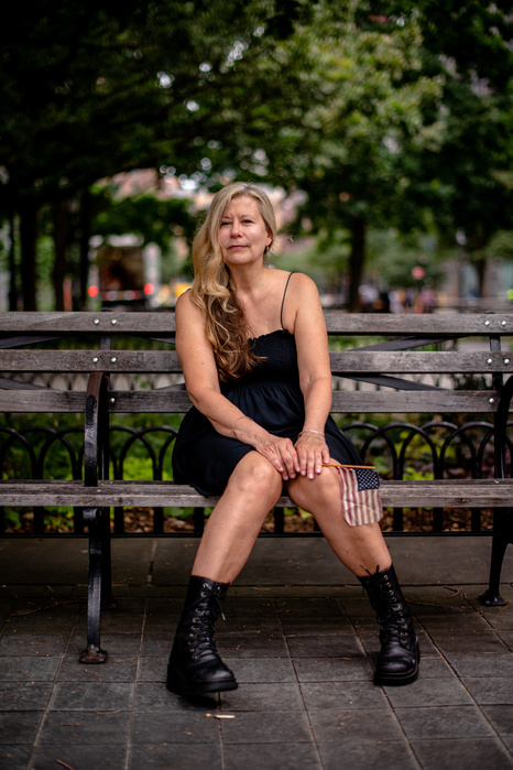 NEW YORK, NEW YORK- JULY 1, 2021: Anne-Marie Principe poses for a portrait in Lower Manhattan near to where the Twin Towers once stood. Principe, 62, was ran a fashion company out of an office in the area. She was on the street when the Towers were attack