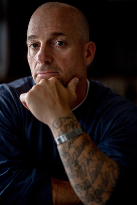 WESTBURY, New YORK- JULY 12, 2021: Mike O'Connell poses for a portrait at his home on Long Island. O'Connell was a fire fighter in Flatbush, Brooklyn when 911 happened. He was a "probie" at the time-- someone very new to the fire department. He had only g