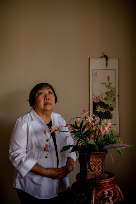FORT LEE, NEW JERSEY- JULY 7, 2021: Yvonne Phang, 69, poses for a portrait at her home in Fort Lee. Phang was diagnosed with breast cancer in 2017 and endured a double mastectomy. She is a tenured professor of accounting at Borough of Manhattan Community