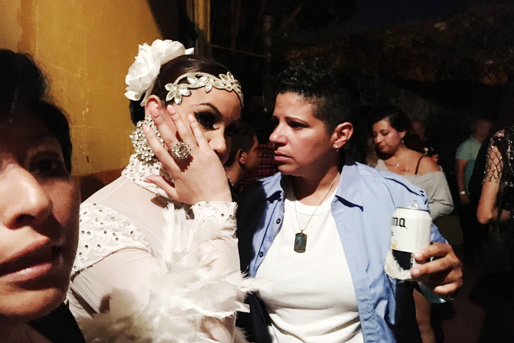 ORLANDO-FLORIDA, JUNE 19, 2016: A performer is comforted by a friend before taking the stage on the first Latin night since the massacre not even a week earlier. The mood at Parliment House was more somber than usual but still full of support and love.