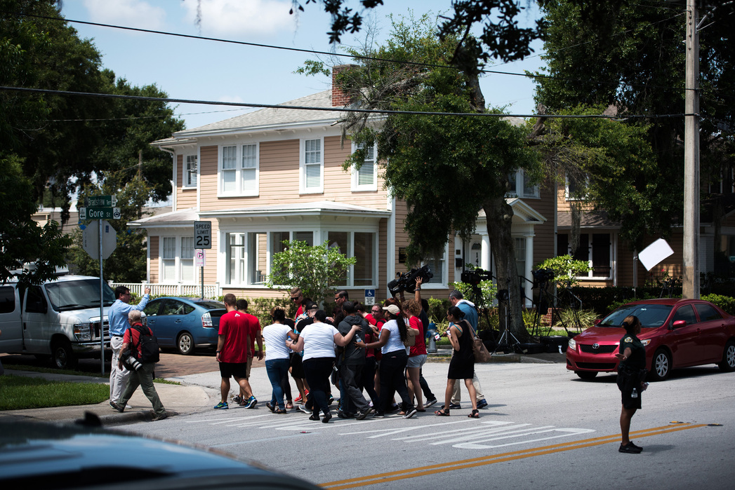 ORLANDO, FLORIDA- JUNE 13, 2016: Families of relatives killed at Pulse Nightclub are escorted out by volunteers at the Delaney Elementary School on Monday following the massacre that occurred early Sunday morning leaving 50 people dead including the shoo