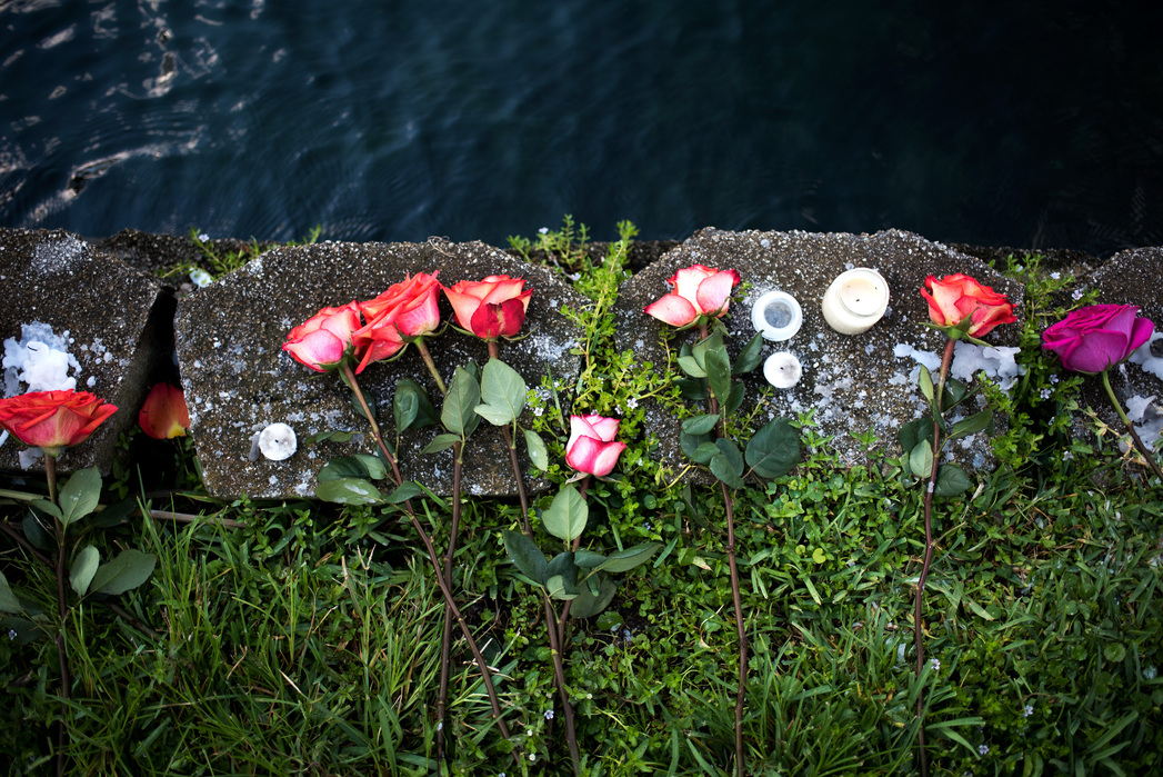 ORLANDO, FLORIDA- JUNE 13, 2016: Flowers left next to Lake Eola on Monday morning.