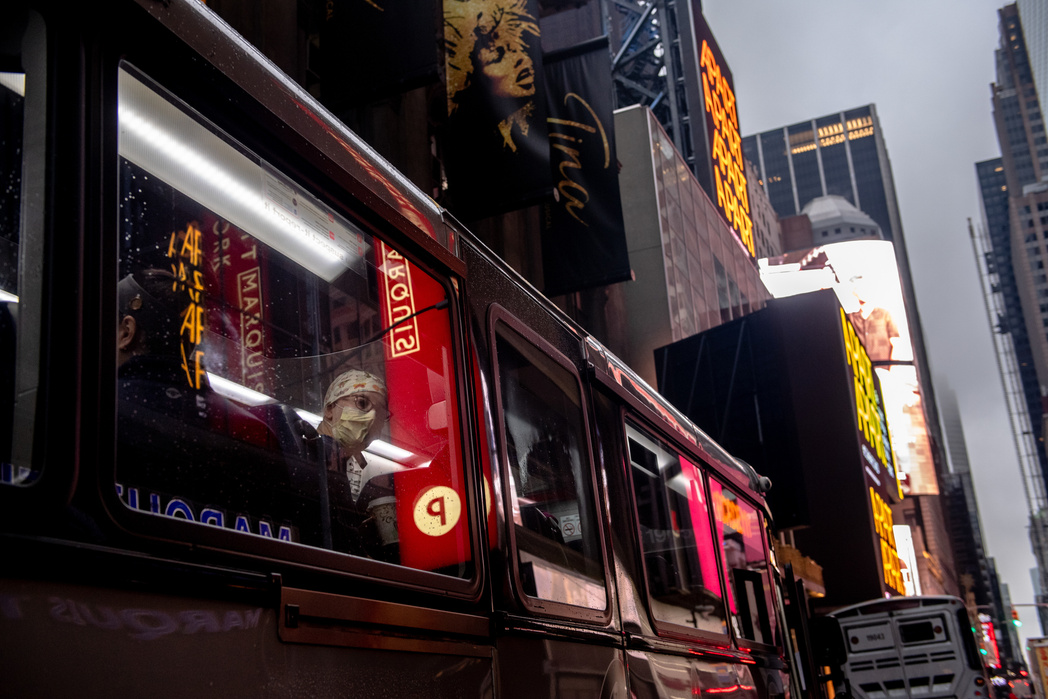 NEW YORK, NEW YORK– APRIL 24, 2020: Nurses from all over the country are put up at hotels throughout New York City. Buses transport some of these health care workers from the New York Marriott Marquis in Times Square to the various hospitals around the ci