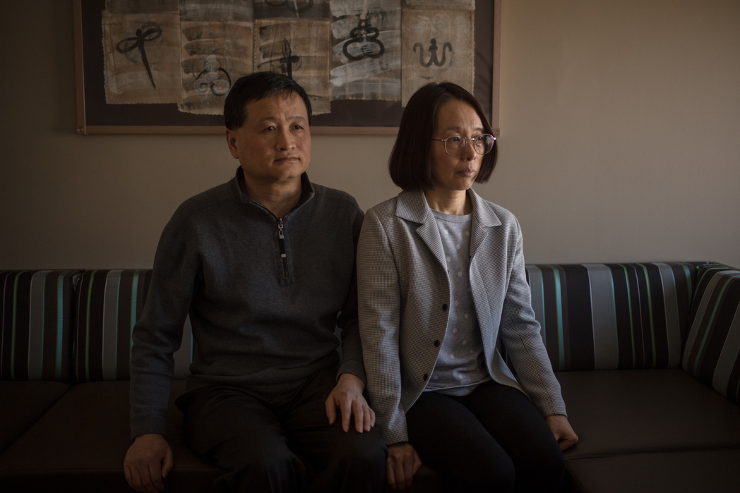 APRIL 20, 2018 - NEW YORK, NEW YORK: Xianguo Kong and Zhao Lin pose for a portrait in their attorney's office in downtown Philadelphia on Friday. Kong and Lin's daughter, Ao "Olivia" Kong, commit suicide while attending University of Pennsylvania in April