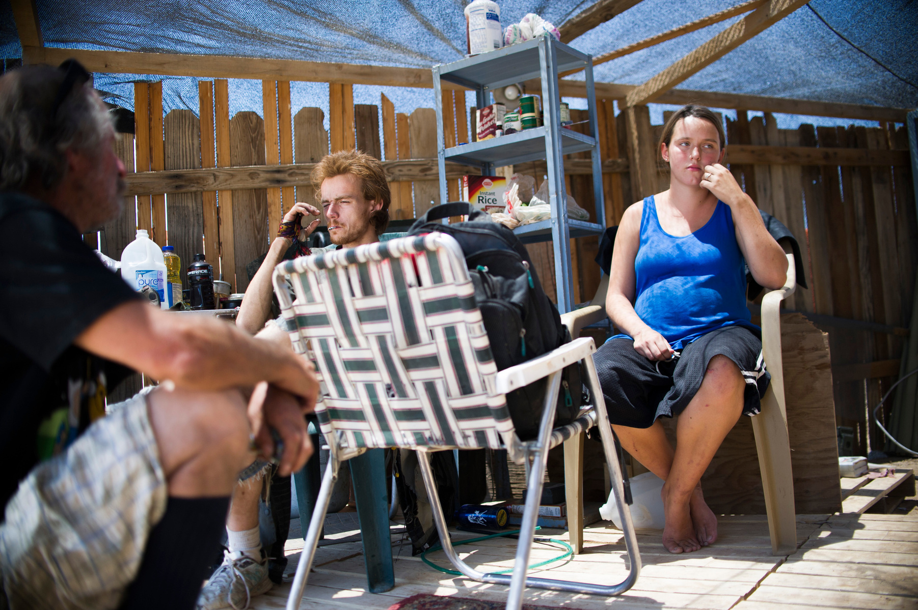 Maryanne, right, is eight months pregnant. She lives in Slab City with her husband. She hardly leaves her trailer and has to ask permission from her husband if she wants to.