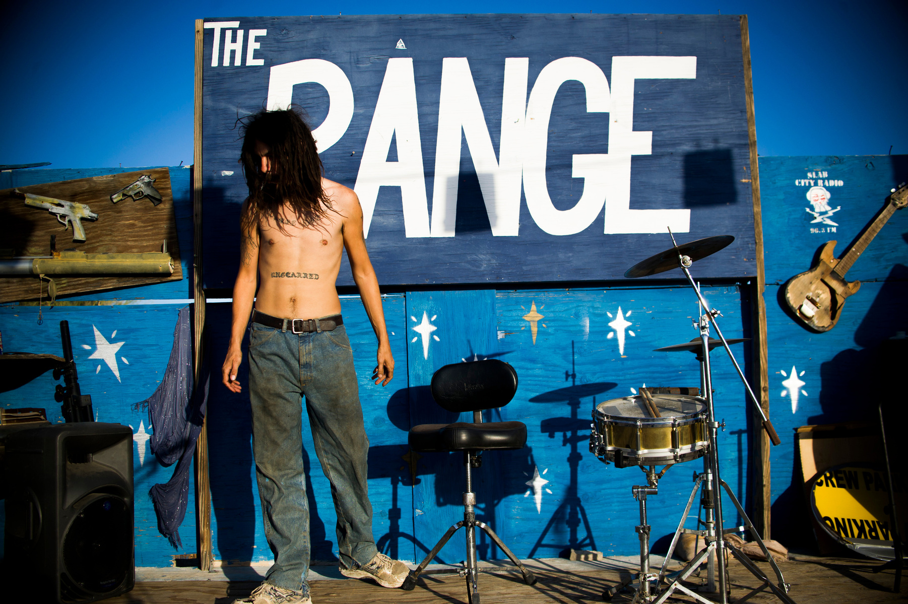 Graham plays metal and rap music to make social commentaries. He performs every Saturday evening at the Range in Slab City, Calif.