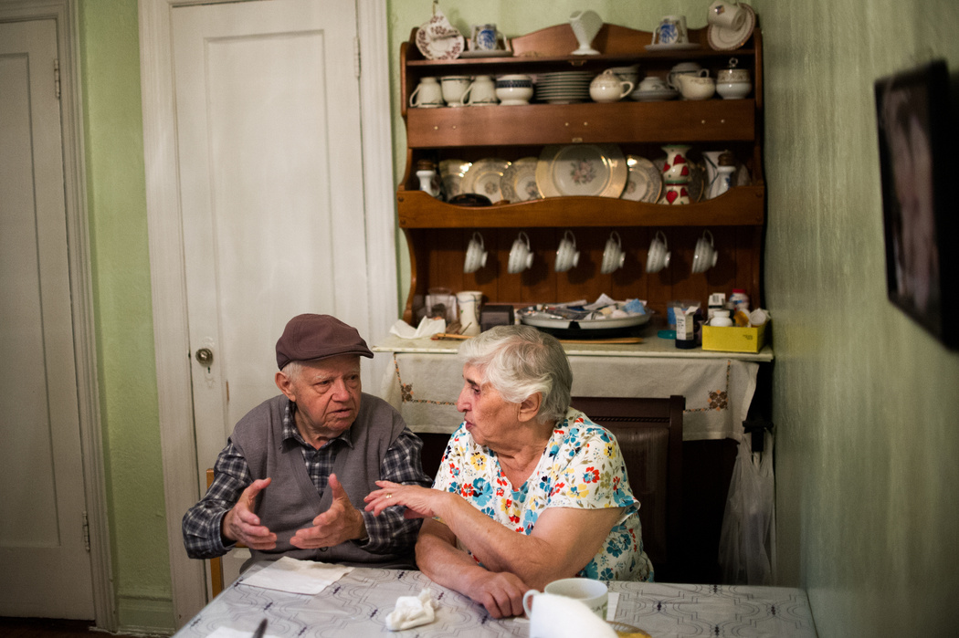 NEW YORK, N.Y.– OCTOBER 2, 2015: Motel Shkolnick, left, and his wife, Dora Shkolnick, sit in their dining room in Brooklyn.