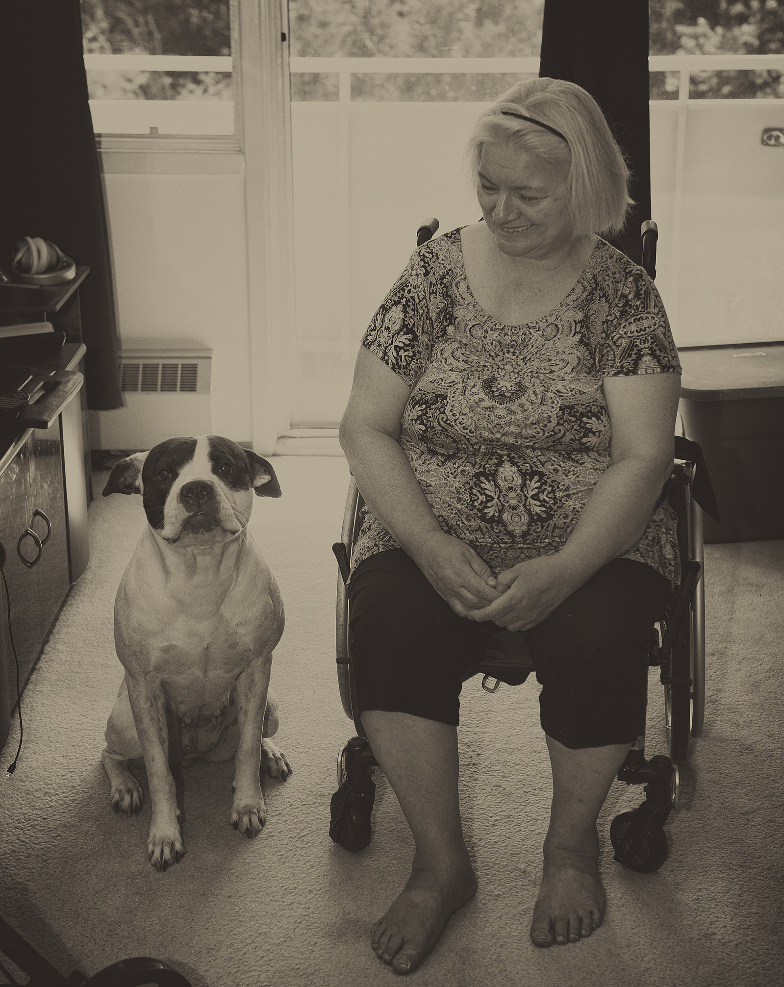 stroke survivor with her companion dog 