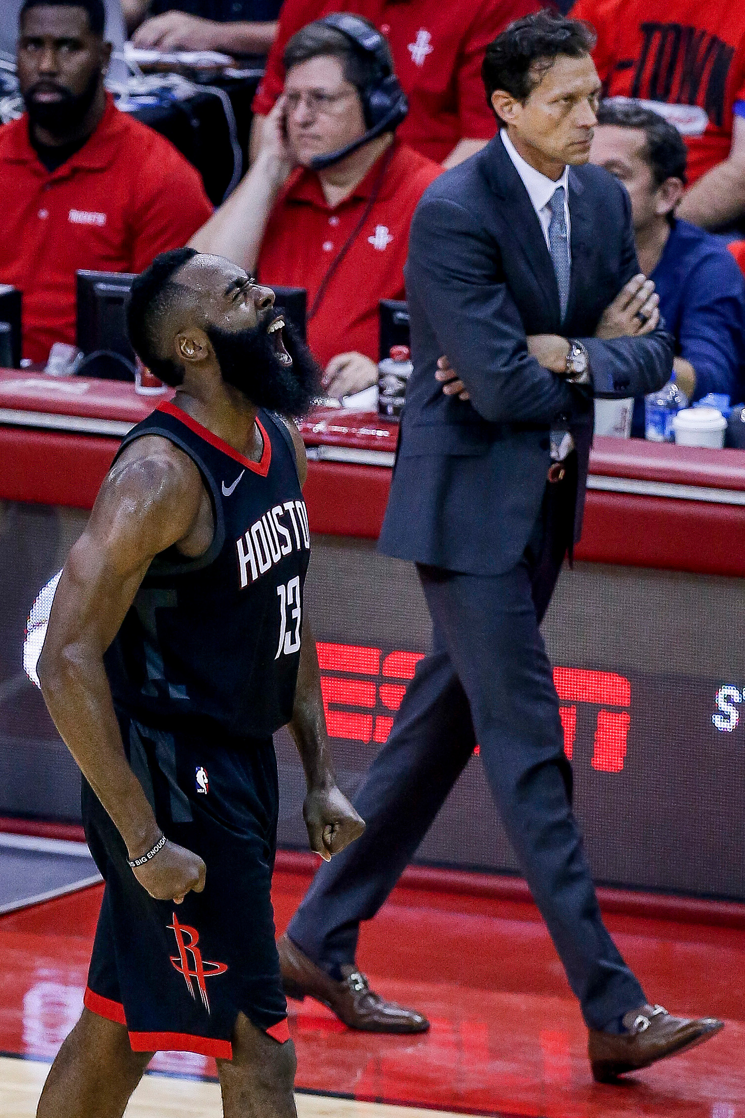 Houston Rockets guard James Harden (13) celebrates much to Utah Jazz head coach Quin Snyder's dismay after Harden caused a Utah Jazz turnover during the first half of Game 1 of the NBA second-round playoff series at the Toyota Center Sunday, April 29, 201