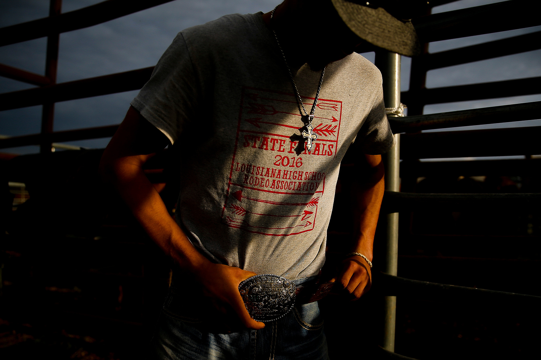 Ty Veillon straps his belt back on after practicing bull riding at the Branded for Christ Cowboy Church Sunday, Feb. 18, 2018 in Huntsville. The church holds practices for aspiring rodeo cowboys and girls every Sunday before church.