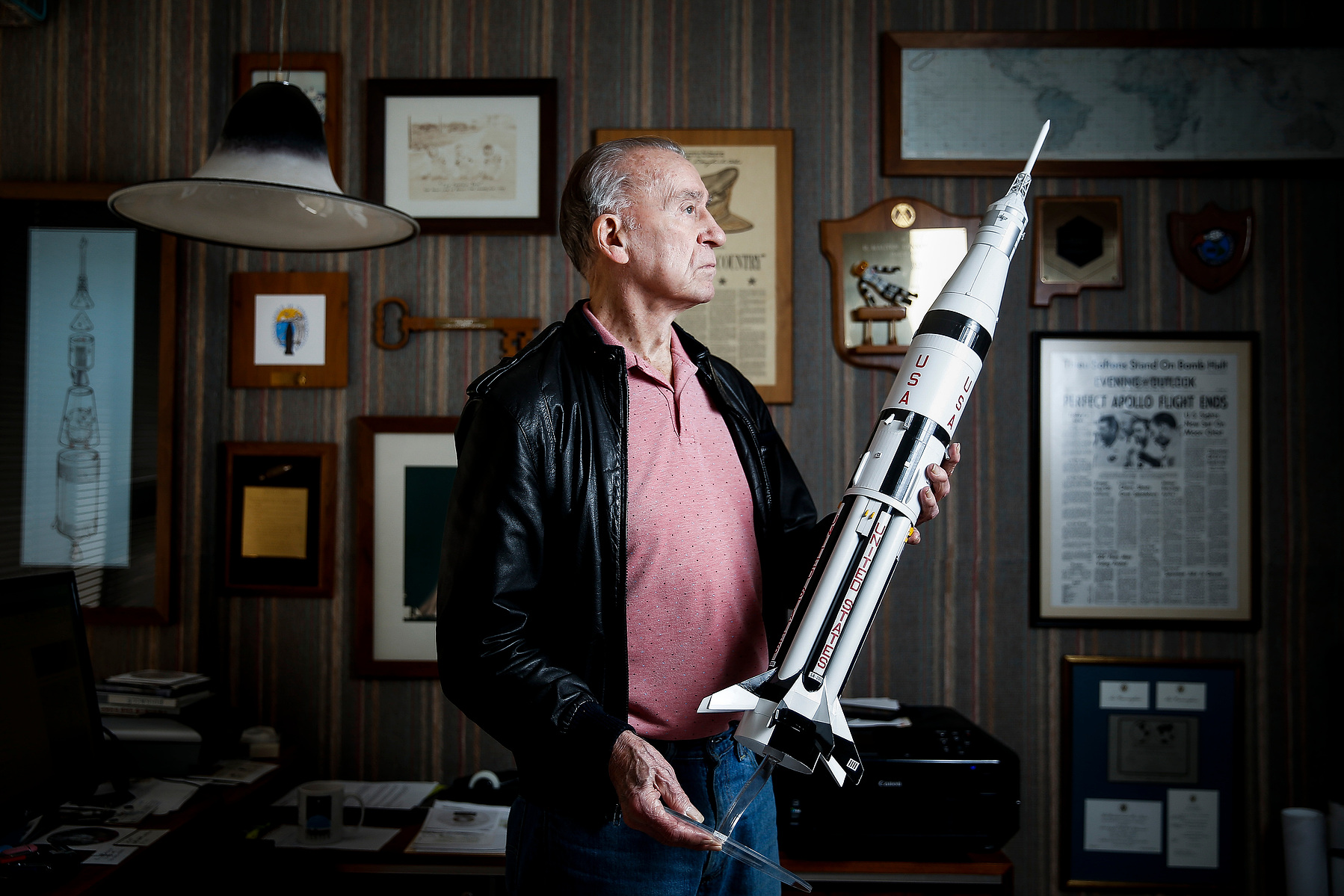 Walt Cunningham, the pilot of the lunar module for the 11-day flight of Apollo 7 - the first manned flight test of the third generation United States spacecraft in 1968, holds a model of the rocket he flew in Tuesday, March 13, 2018 in Houston.