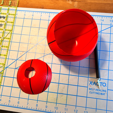Rubber toy basketball cut in half