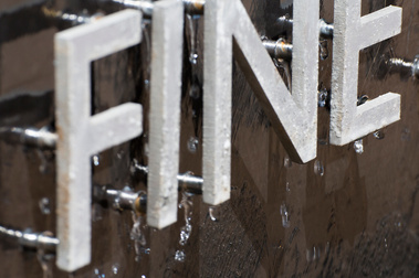 Pin mounted letters with water droplets
