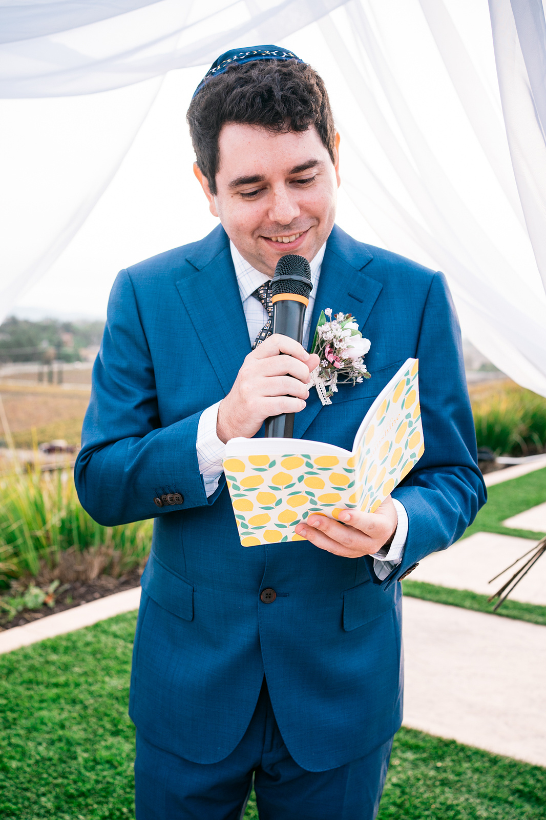 groom reads his vows in korean and english