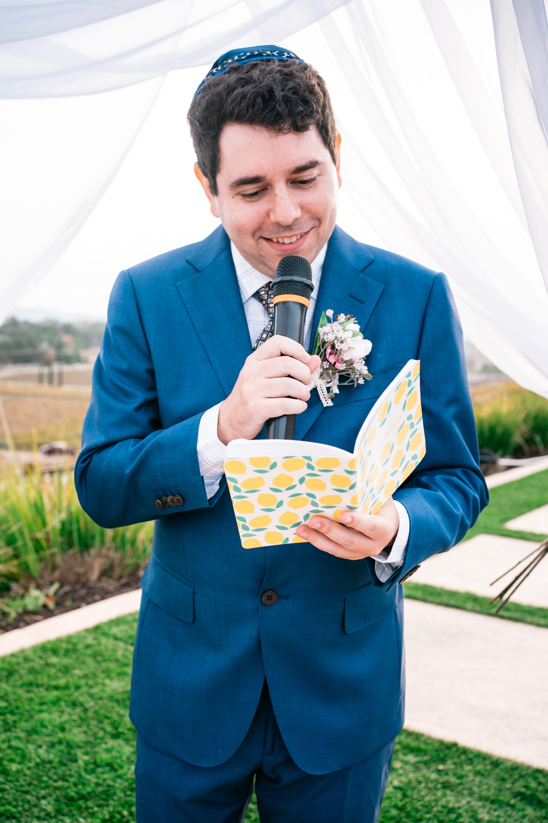 groom reads his vows in korean and english