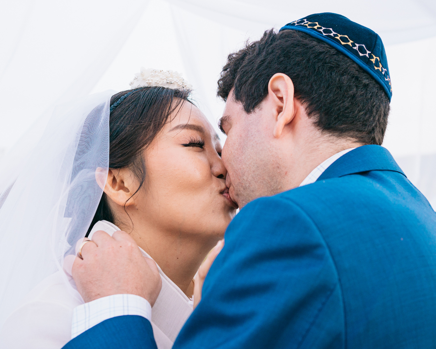 "you may kiss the bride" or something like that bride and groom kiss