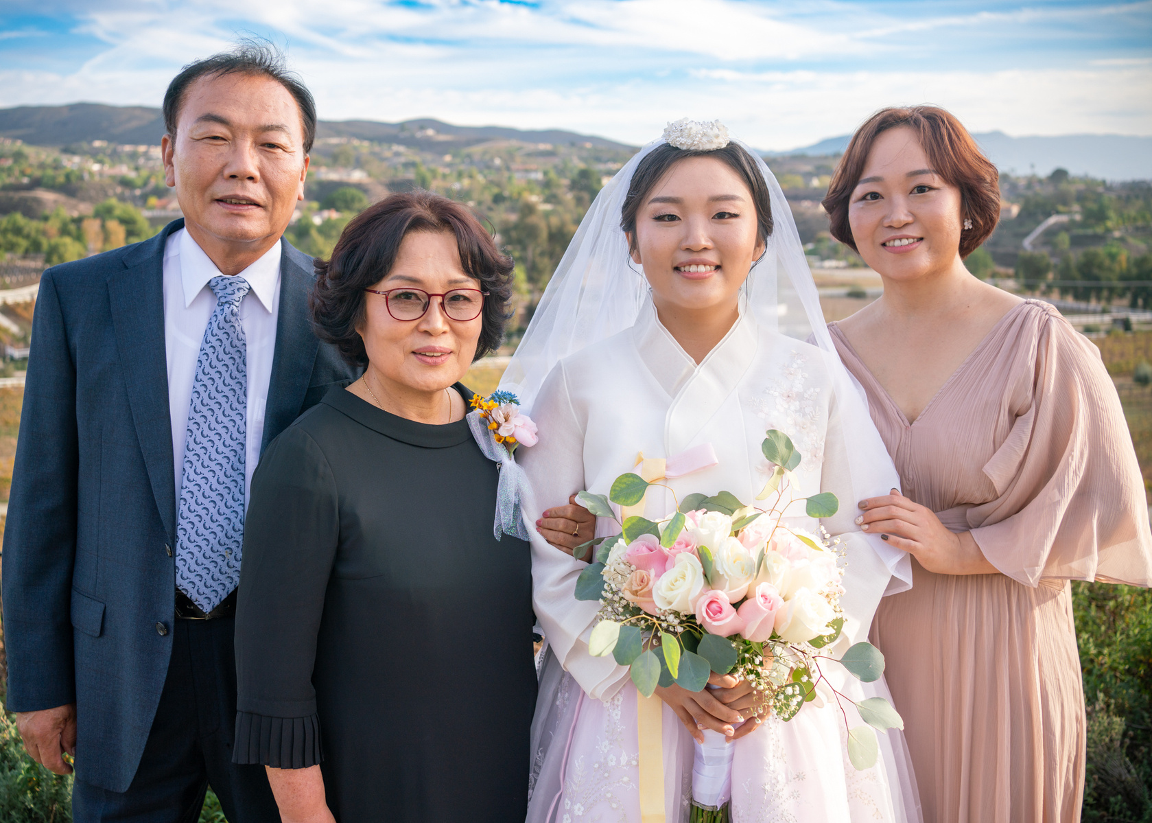 korean bride in her traditional hanbok with her family temecula wine country wedding california 