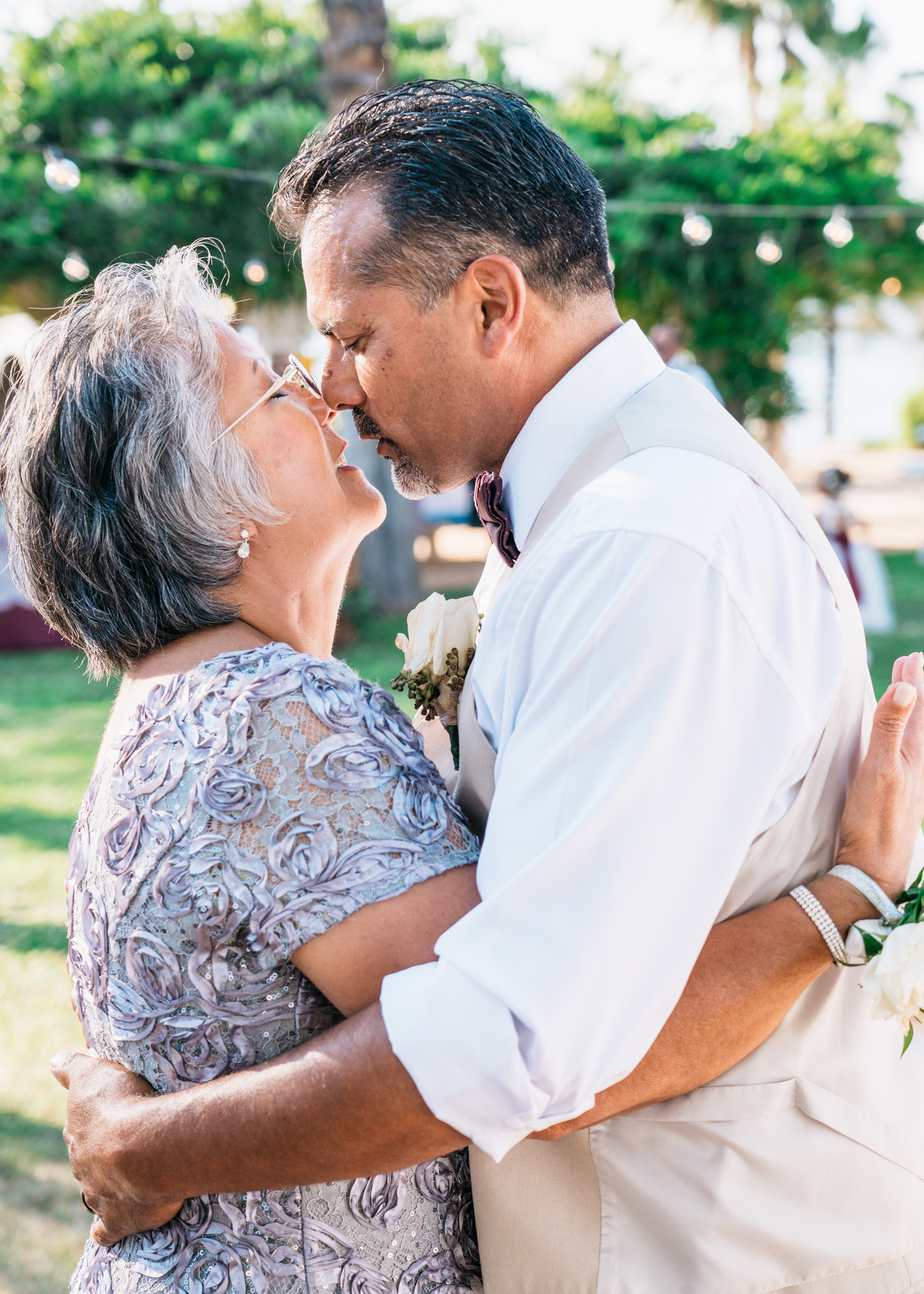 mother/son dance mother of the groom nose to nose with her son