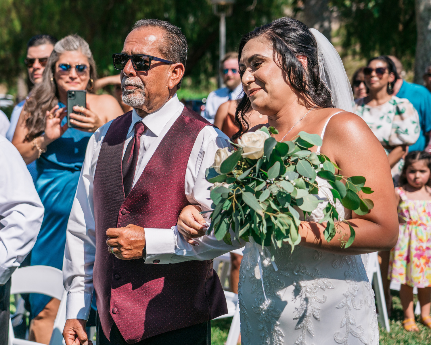happy bride and her father arm in arm canyon lake wedding