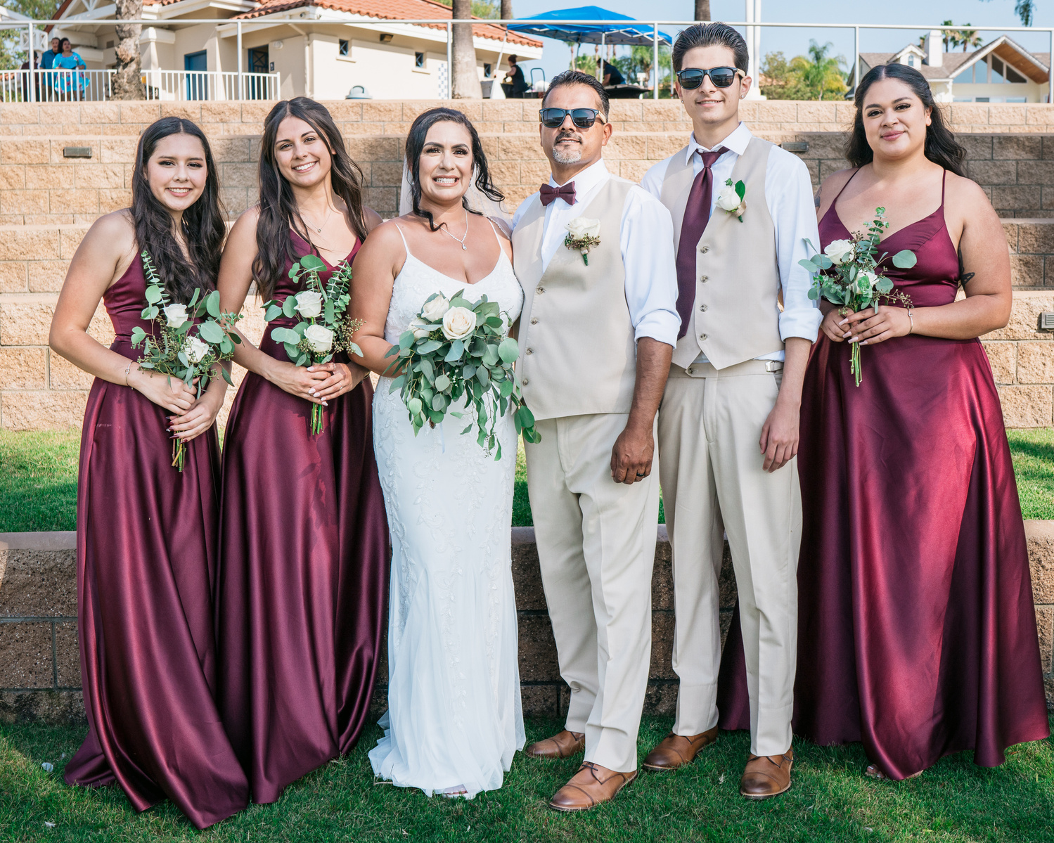 family formal bride and groom and his children
