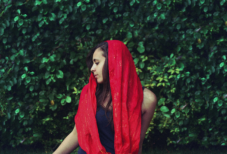 Fashion Portrait of Young Woman with red scarf