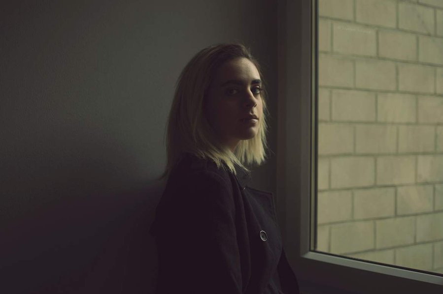 Dramatic Emotional Indoor Portrait of Girl with Soft Natural Light