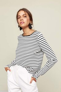 photo model in striped t-shirt on plain background