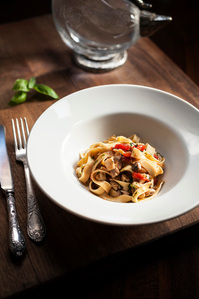 italian pasta on wooden table