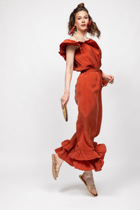 model in copper tone dress