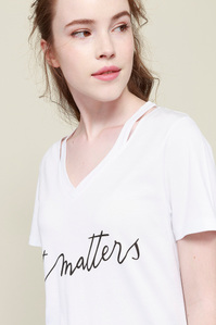 model with white t-shirt plain background