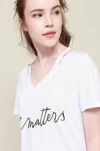 model with white t-shirt plain background