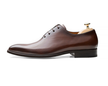 hand made leather shoes photographed on white background 